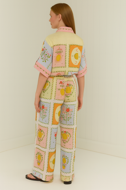 Elegant floral print trousers and long-sleeved blouse set 